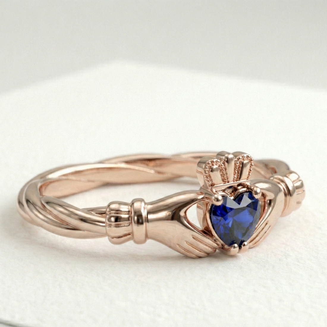 Sapphire claddagh ring.
