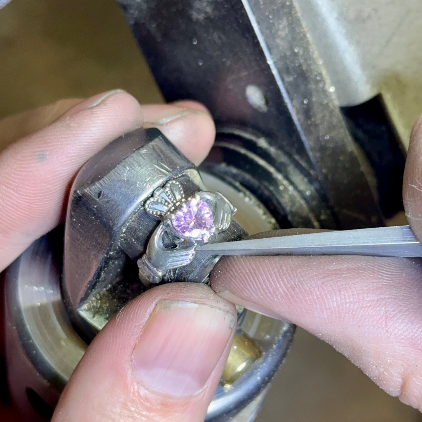 Claddagh ring, ladies silver claddagh ring, set with sparkling pink cubic zirconia stone.