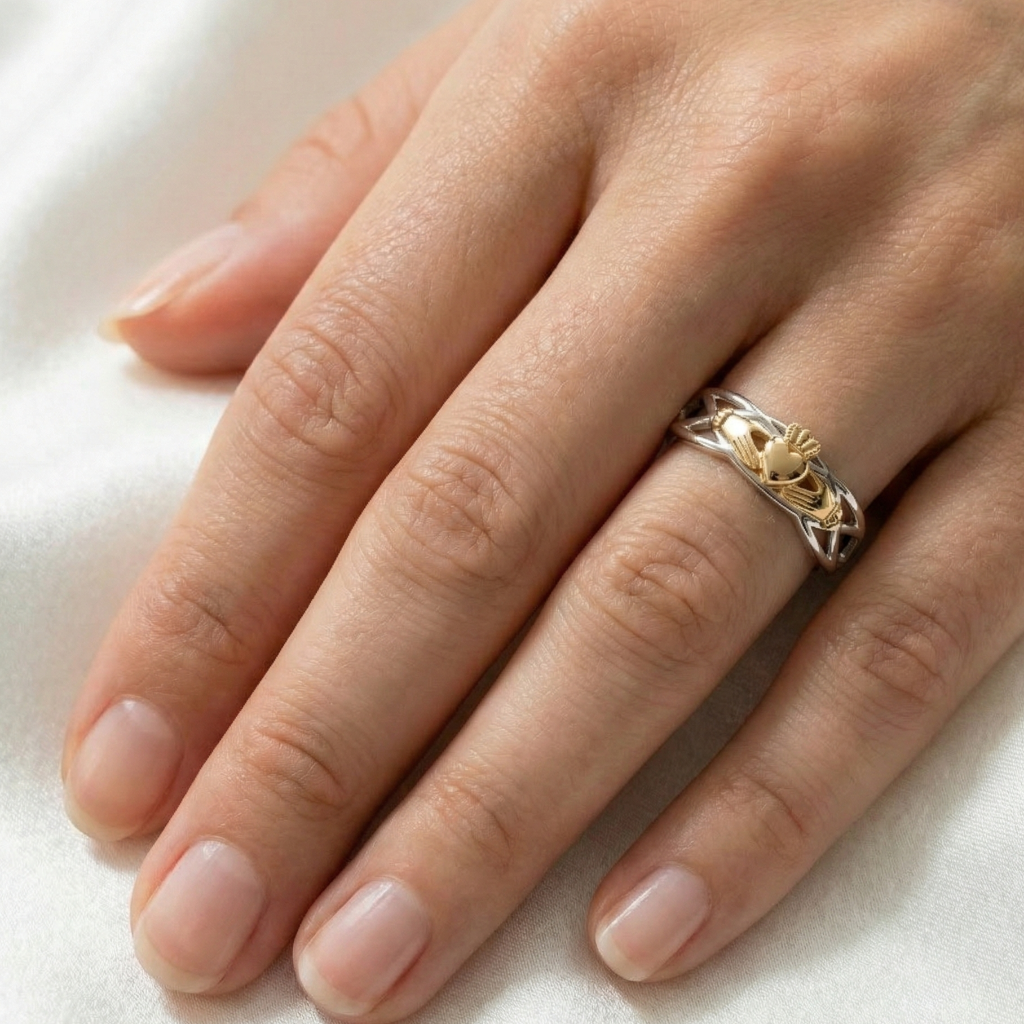 gold claddagh on a hand picture 